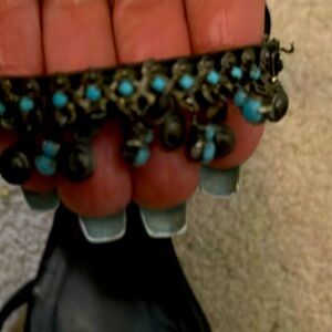 Stuart Weitzman Size 10 beautiful metal and blue stone attached.Good condition